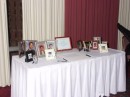 Our Memory table with photos of both the bride and groom. In lieu of having a traditional guest book, Lamar and Angela had their guests sign a picture frame with their well wishes.